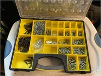 Storage container full of screws, washers etc