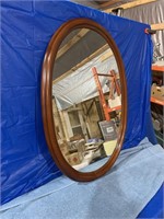 Oval mirror measures 37 x 24