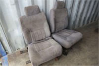 PAIR OF CLOTH COVERED BUCKET SEATS (ONE POWERED)