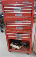 Craftsman tool box with an assortment of tools.