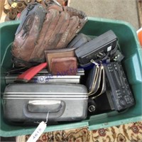 Tub--mostly electronics; ball glove, wallets