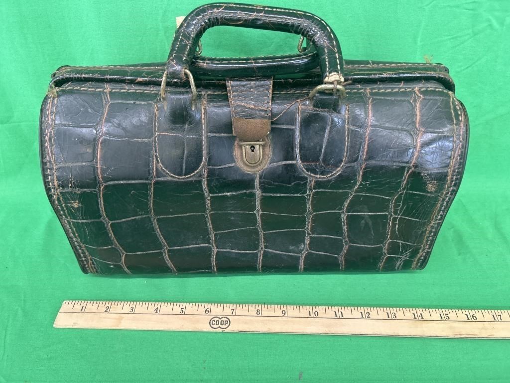 Antique doctor’s bag, one corner needs mending