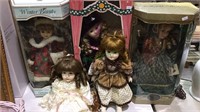 Five Porcelain head dolls, 3 in the box, all in