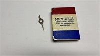 Michael’s Department Store coin bank with key