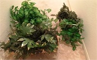 810 - PAIR OF LARGER FAUX PLANTS IN BASKETS