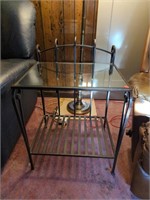 Heavy metal and glass side table