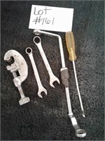 Plumbing cutter, wrenches and a screwdriver
