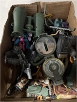Binoculars, grenade, compass, and more