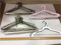 Assorted hangers-= wire and plastic