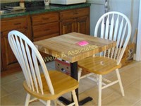 Small butcher block kitchen table with two chairs