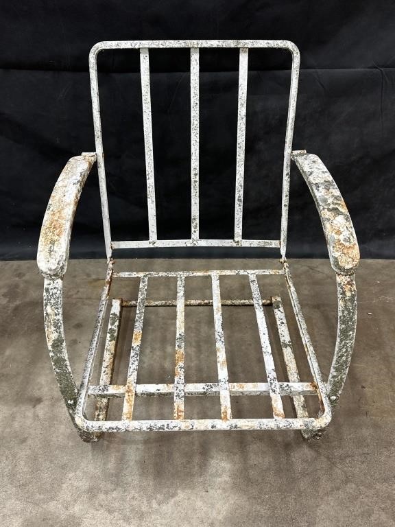 Metal patio rocking chair, weather worn