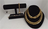 2 BRACELETS AND 2 GOLD TONE NECKLACES