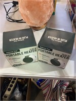 pair of portable heaters