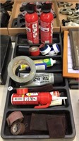 Fire extinguisher, tape, grease