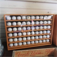 Golf balls in showcase