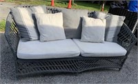WICKER SOFA W/ CUSHIONS AND PILLOWS AND COFFEE