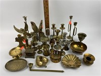 Brass candle stick holders, brass bud vases, and