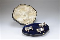 Cased set of English silver open salts