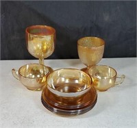 A collection of peach glass