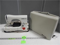 Necchi sewing machine with carrying case; we didn'