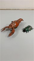 Tin rolling lobster and beetle