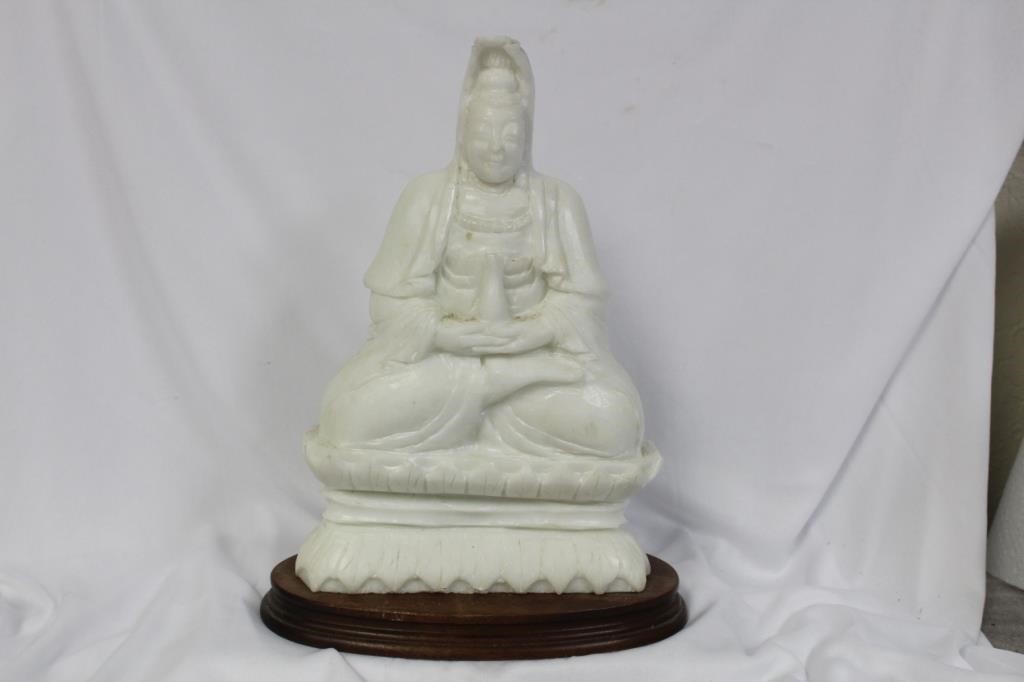 A Solid Marble Kwan Yin on Wood Stand