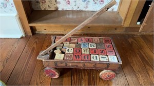 Antique wood toy wagon, with original printed