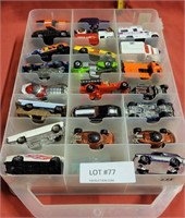 STORAGE CASE NEARLY FULL OF TOY VEHICLES