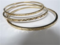 Three 14k gold bangles, 22 gms