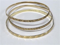 Three 14k gold bangles, 19 gms