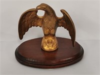 Cast metal Eagle on Oval Wooden Stand