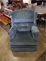 Blue recliner. 38x34x34.