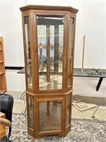 Corner Curio with mirrored back.  Perfect display