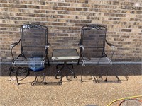 2 wrought iron chairs and metal glass topp table