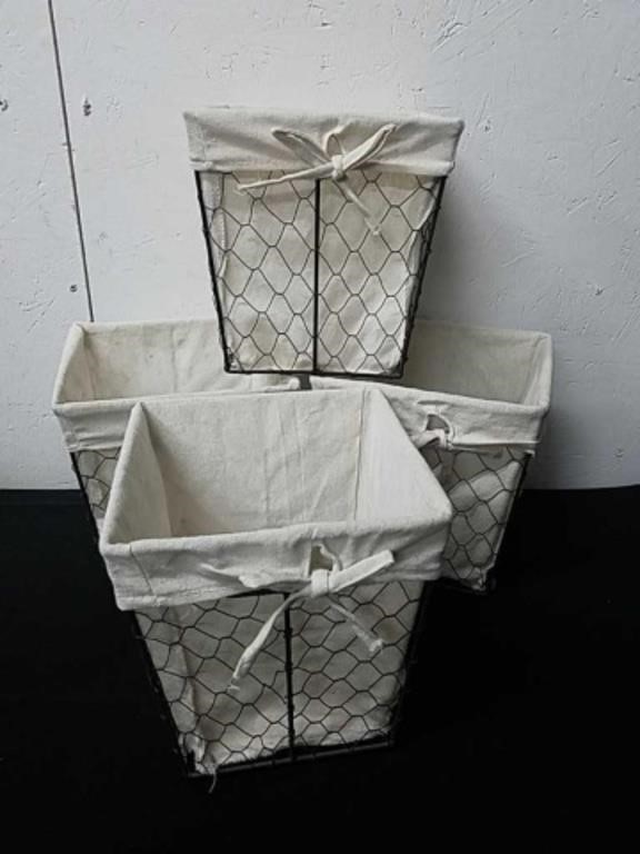 Four wire and fabric baskets they measure 8x 8x