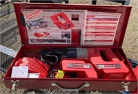 Milwaukee Cordless Saw/ Charger and Batteries
