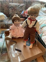 TWO DOLLS ONE 14IN TALL OTHER IS SITTING 10IN