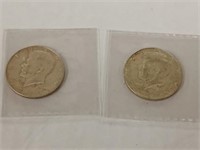 Two 1964 silver Kennedy half dollars