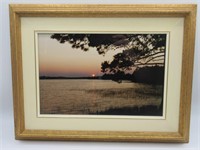 FRAMED PHOTOGRAPH OF SUNSET OVER THE LAKE