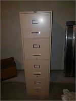 Tall metal file cabinet
