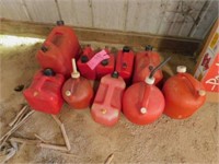 10 plastic gas cans w/ air openings 1 - 5 gal