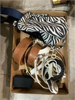 box lot of belts and zebra bag