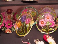 Five decorative fusion glass plates depicting