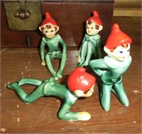 group of 4 porcelain Christmas elves in various