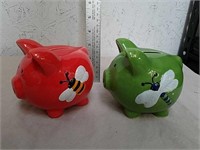 Pair of ceramic piggy banks with plugs