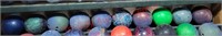 10 qty bowling balls on bottom row