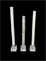 SET OF THREE TALL CYLINDRICAL SCUPTURES