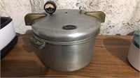 Steam line pressure cooker