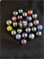 Group of vintage marbles with one shooter