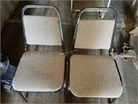 2 chairs. Metal frames with cloth seats.  As is.